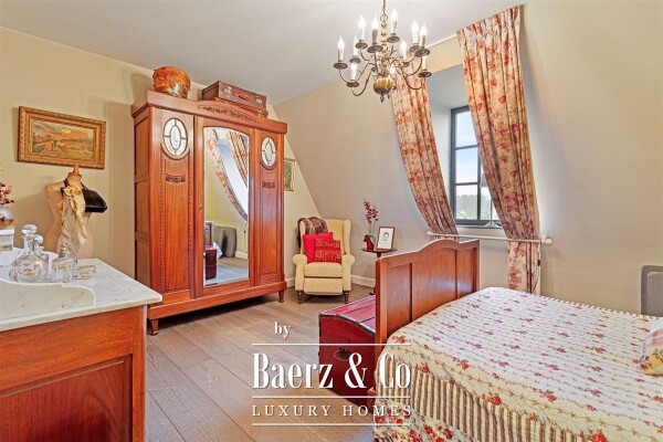 photo 30 Uitzonderlijke Duplex met zicht op kanaal, garage, carport en ruime (wijn)kelder!