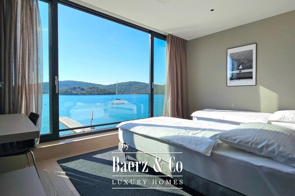 photo 2 Tisno, modern villa with a swimming pool, first row to the sea